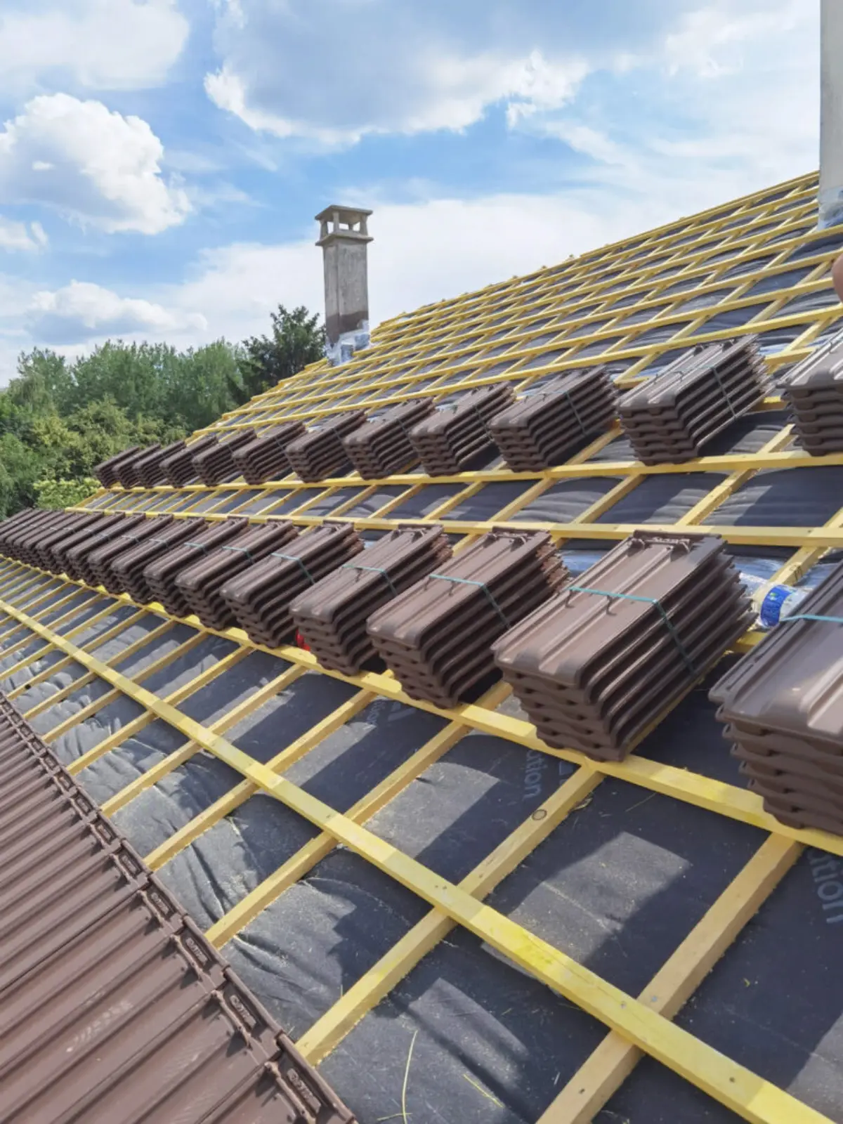 Rénovation toiture tuiles Paris 75